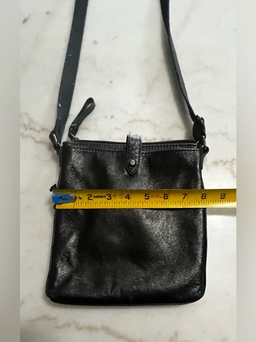 The Sak Black Leather Crossbody Bag with Gold Hardware And Colorful Lining